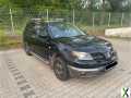 Foto Mitsubishi Outlander 2.0 Sport 4x4 Zwei Auto ein Preis