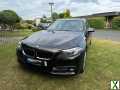 Foto BMW 520d Touring (Luxury Line) Jatobagrün-Metallic