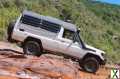 Foto Toyota Land Cruiser HZJ78 Buschtaxi